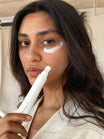 Alpha-H Liquid Gold Firming Eye Cream model met tube