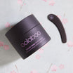 Oolaboo Beauty Sleep Night Cream met spatel op bloesem