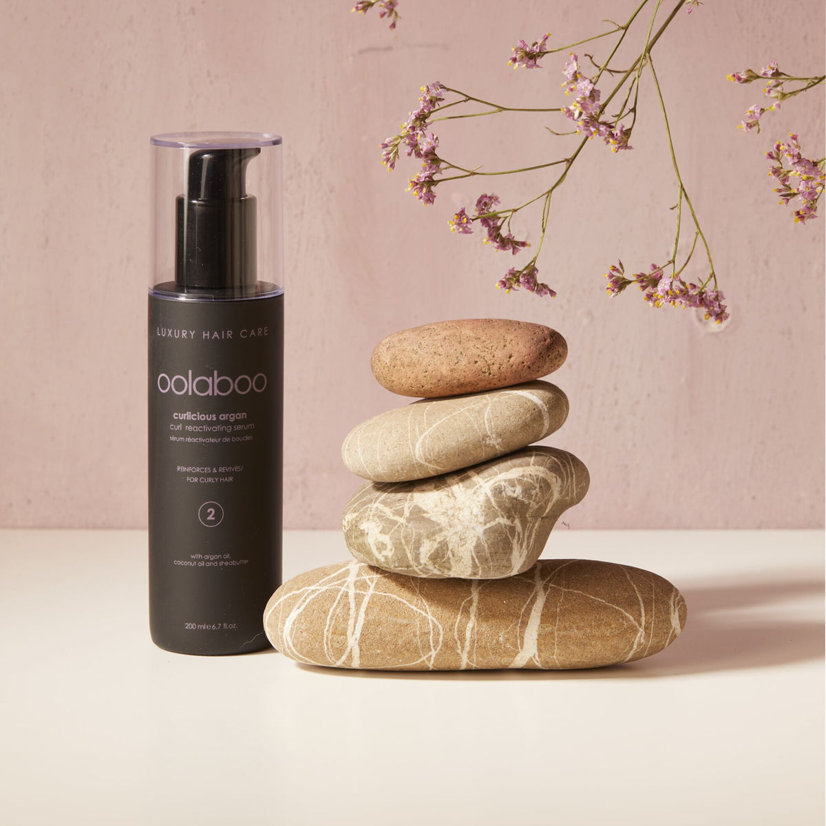 Oolaboo Curlicious Argan Curl Reactivating Serum bij gestapelde stenen