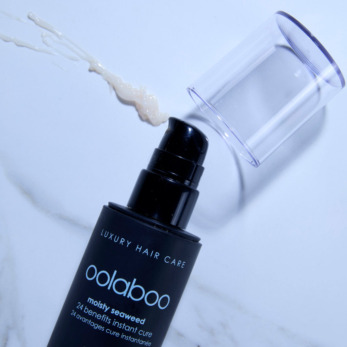 Oolaboo Moisty Seaweed 24 Benefits Instant Cure met crèmetextuur op marmer