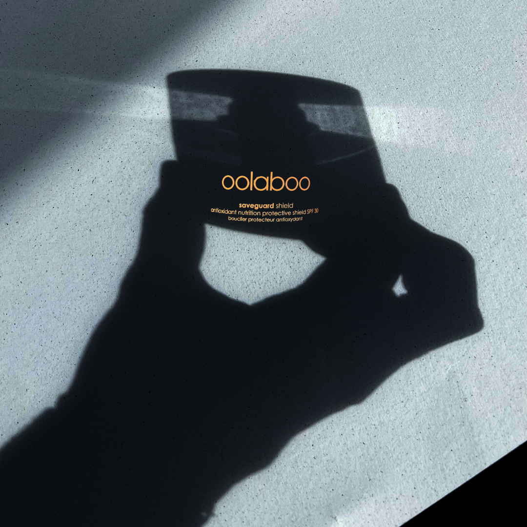 Oolaboo Saveguard Protective Shield SPF30 met schaduw van een hand
